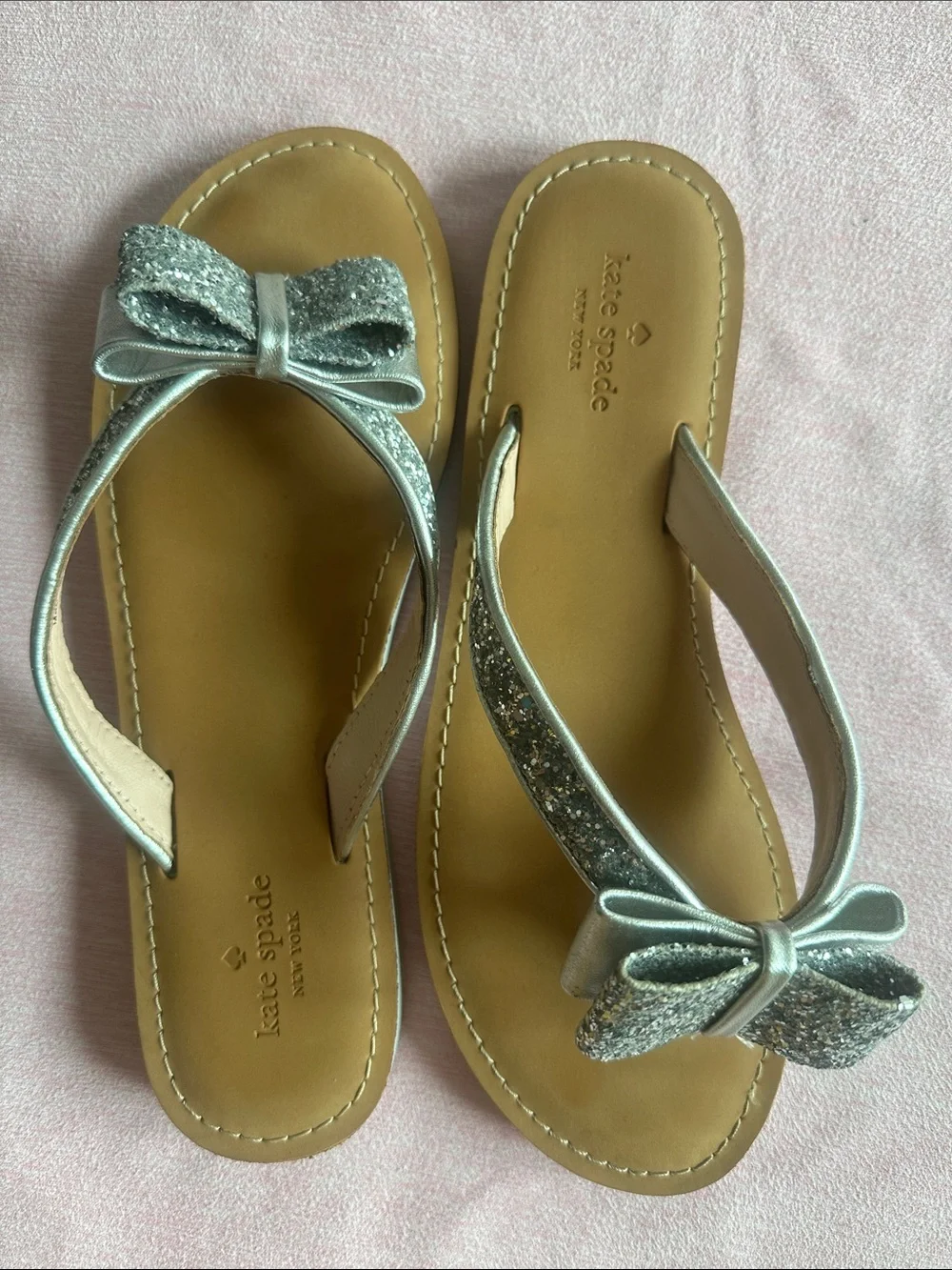 kate spade Silver Glitter Bow Thong Sandals with Tan Footbed